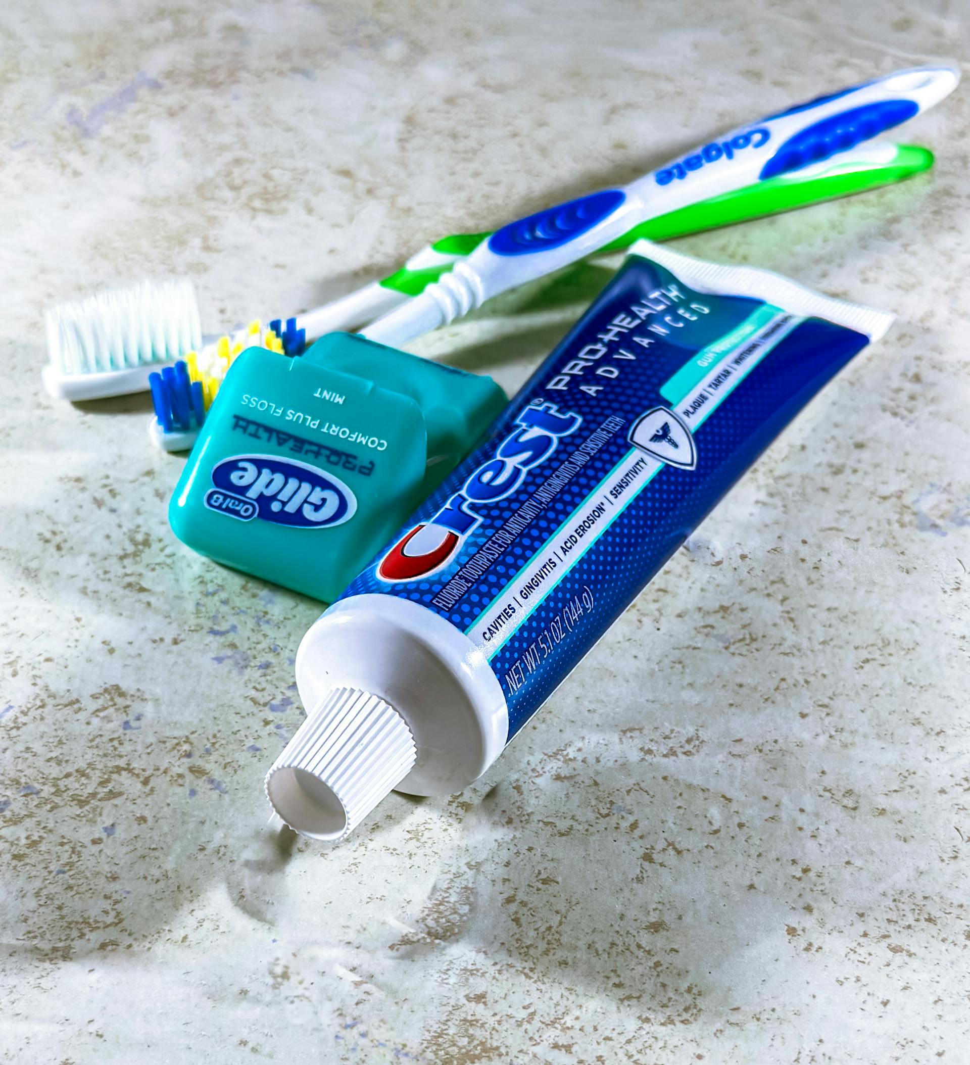 Editorial dental hygiene still-life on marble